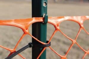 Figure 3 - Orange Construction Fence Attached With Pole Teeth And Zip Ties