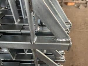 parapet clamp guardrail system surface treatment